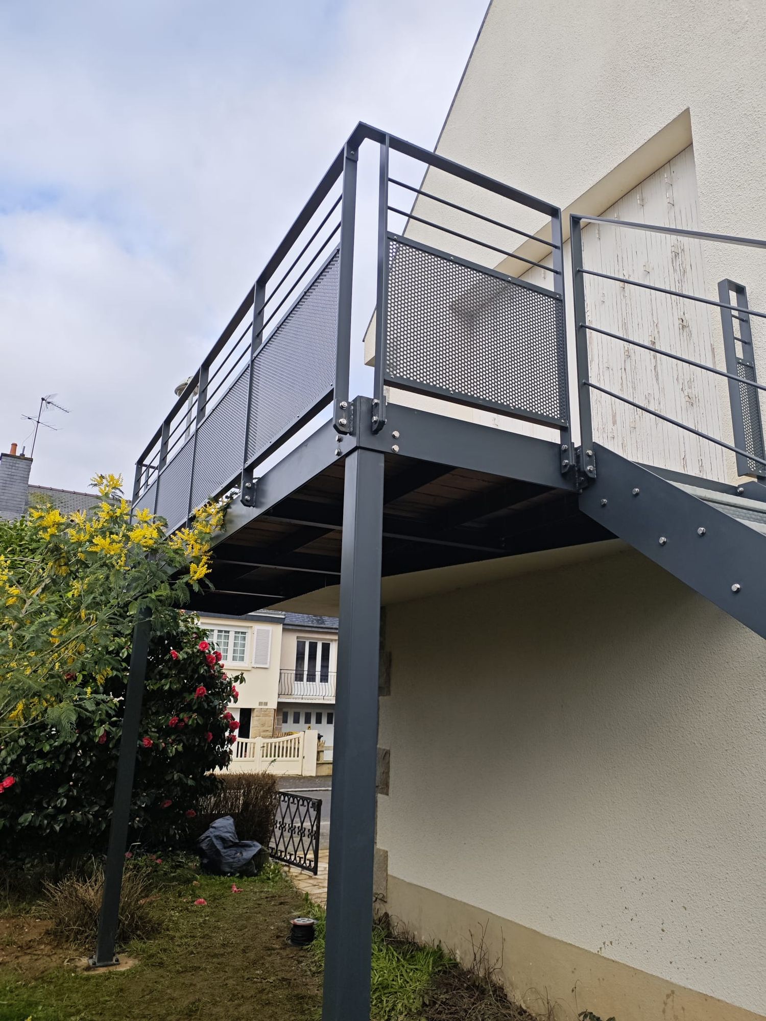 Extension de balcon et création d'escalier